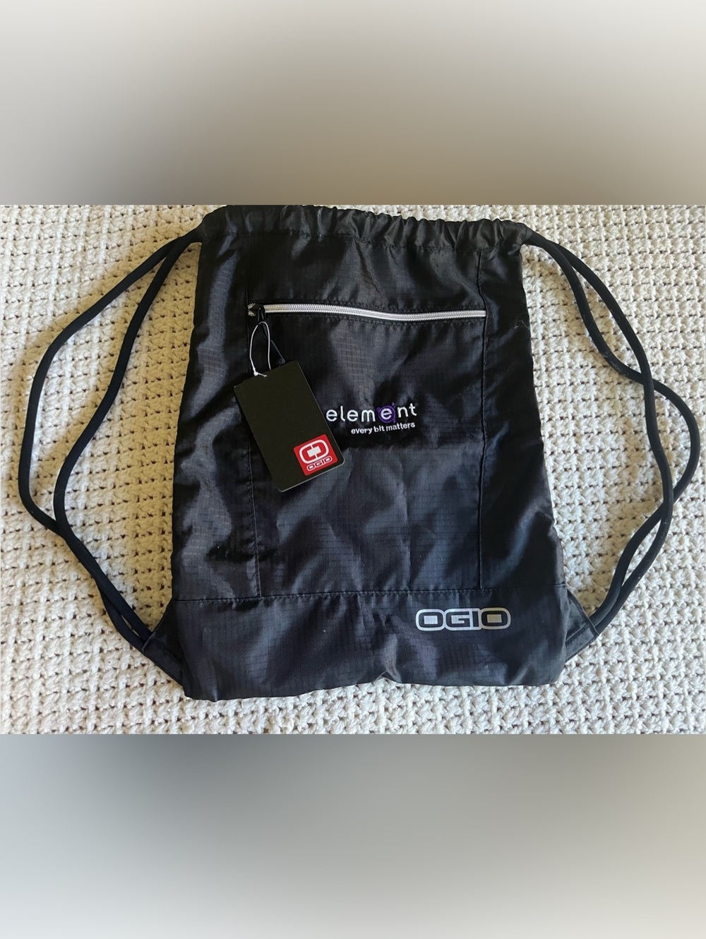 OGIO drawstring backpack NWT - 2 zipper pockets - bungee cord texture straps